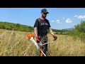 Stihl Fs 460-C mowing big grass with brand new brush knife.( Motocoasa cu cutit de desis la lucru)