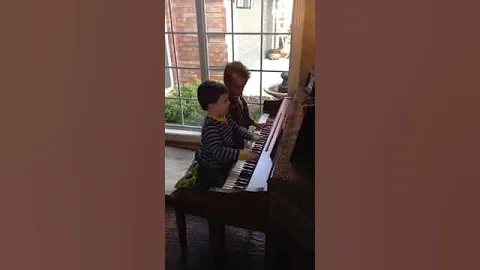 Levi & Kamden playing piano