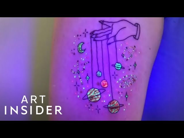 multiple blue glowing tattoo designs. Long designs