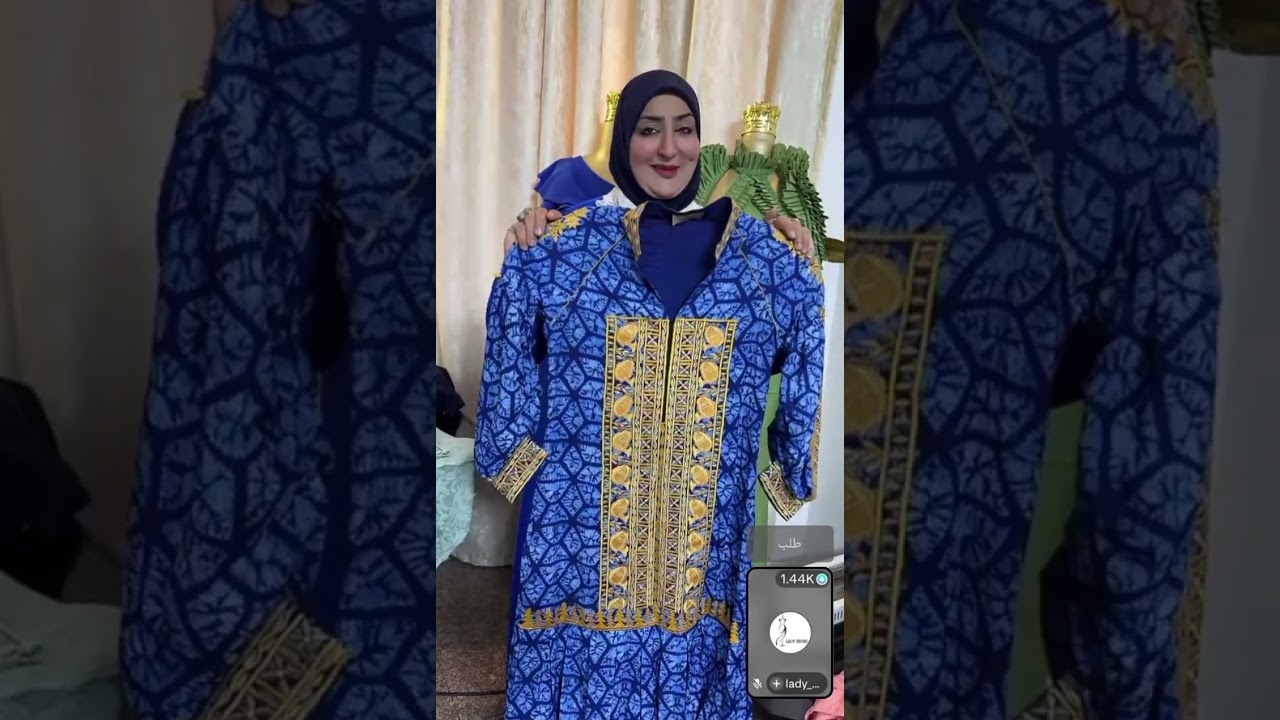 ام على الخياطه كتير شاطره