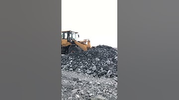 Huge land Filling progress  SDLG Machine Pushing Rock Uploading Dump Truck On Construction.