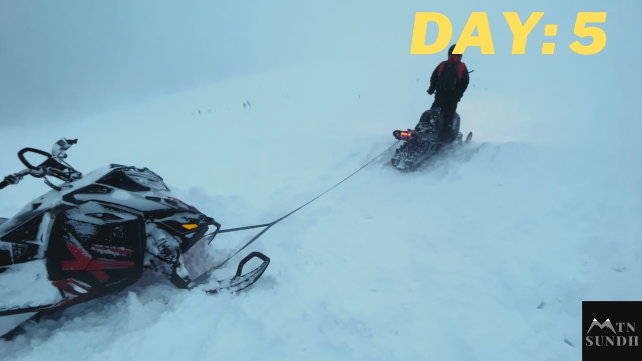 Recovering our Abandoned Snowmobile and towing it out with 2 Turbo Snowmobiles!