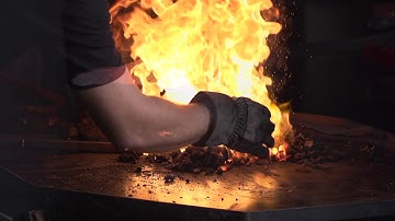 Blacksmith Artist Marcus Mars forging in slow motion.