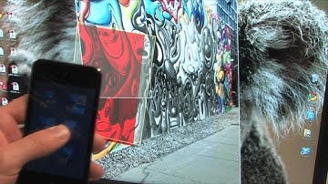 Virtual Projection: Exploring Optical Projection as a Metaphor for Multi-Device Interaction