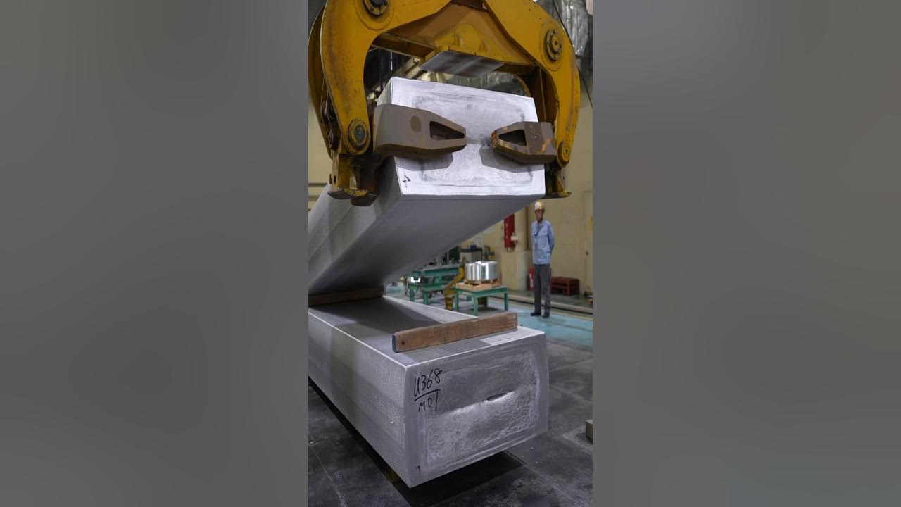 The process of making aluminum slabs from used aluminum cans. Japanese