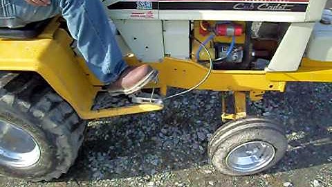 cub 128 pulling tractor