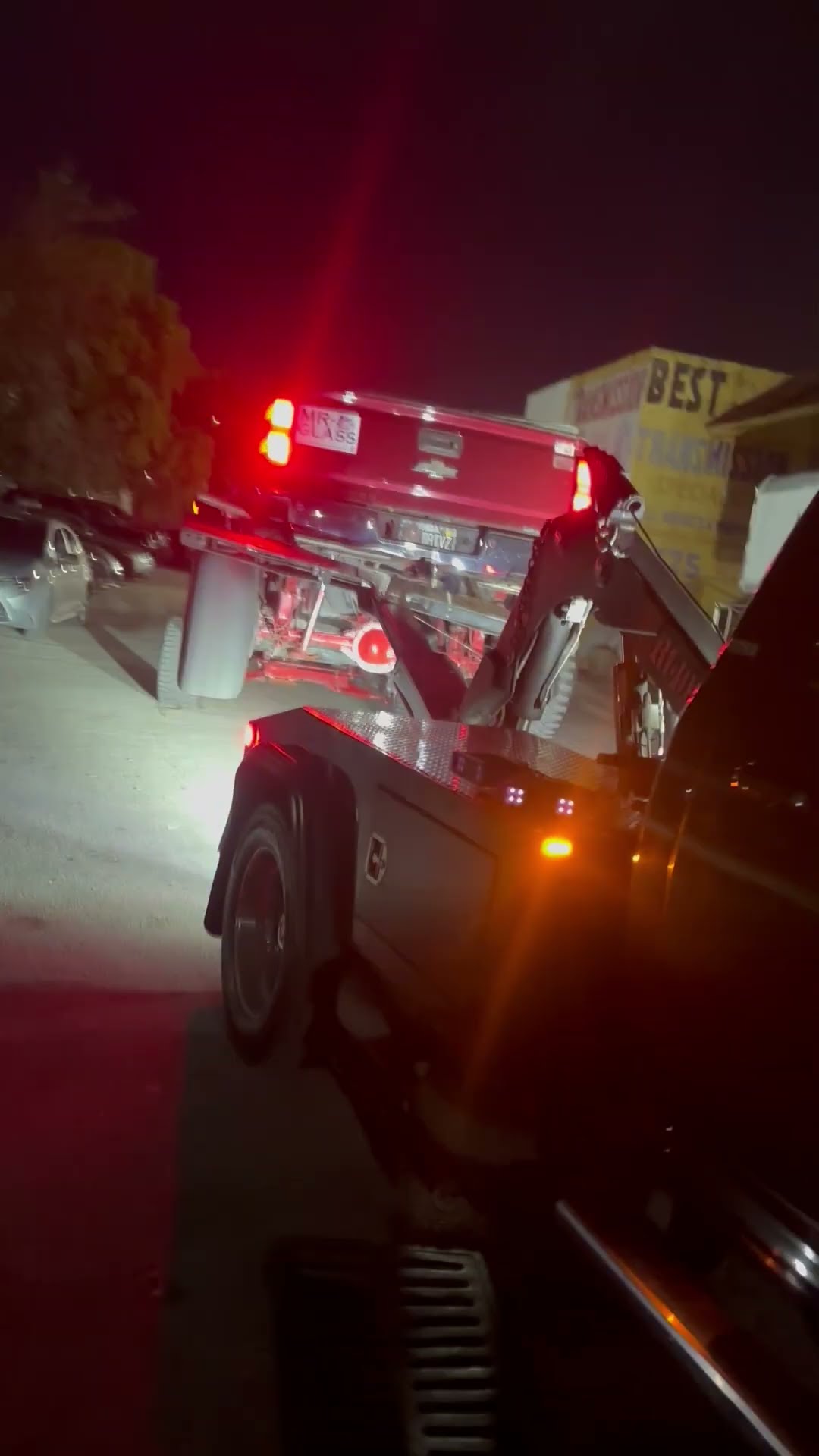 Truck Gets Stuck on Tow Truck During Escape Attempt