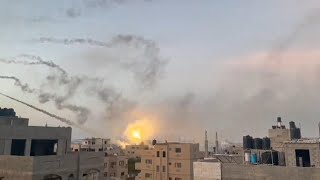 Palestinian militants launch dozens of rockets into Israel