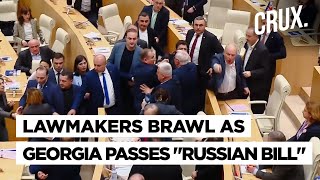 Fisticuffs Inside Georgia's Parliament As Lawmakers Pass Controversial 'Russian Bill' Amid Protests