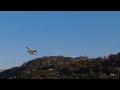 Four firefighter planes taking water from Douro river