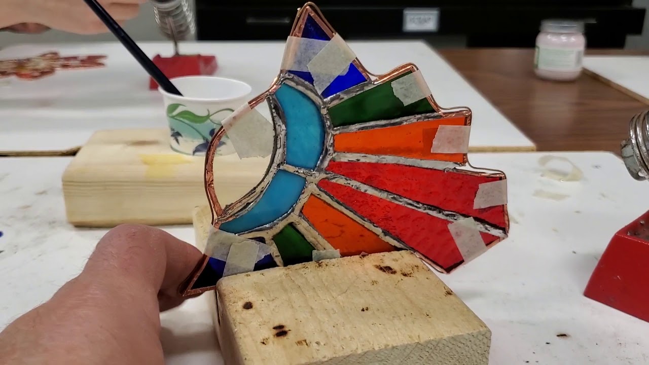 stained glass .How to spot solder the wire around the outside.