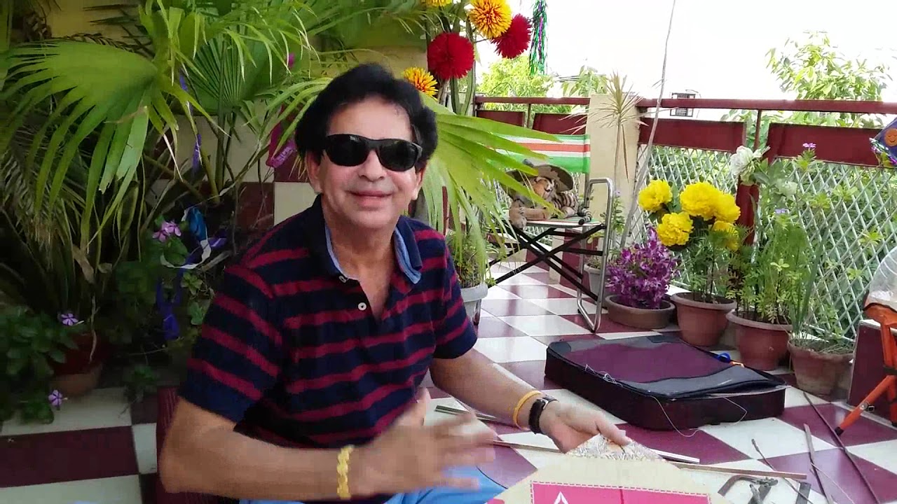 MAKING A KITE WITH WASTE MATERIALS.