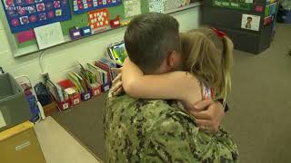 Navy officer surprises daughter at school