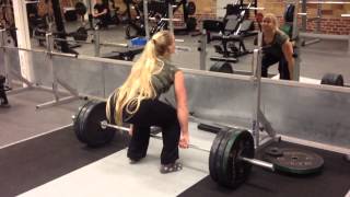 Sarah Bäckman and her brother working out, deadlift