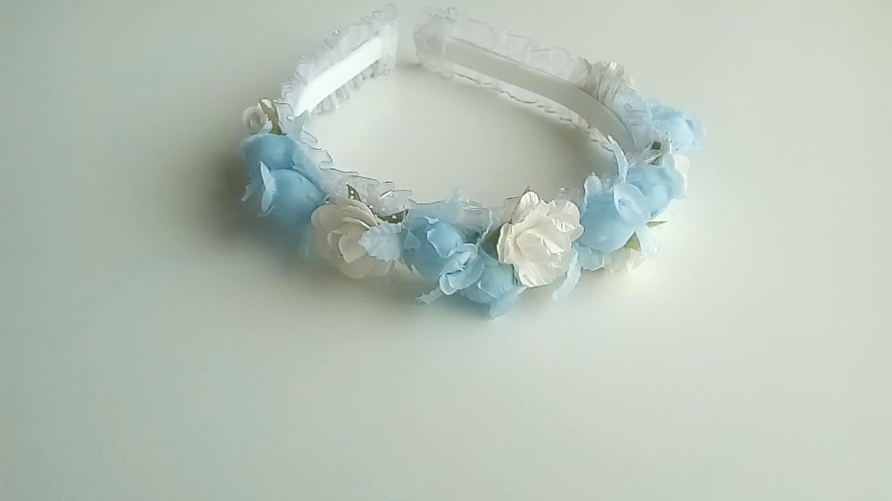 VINCHA ALBICELESTE DE FLORES ANDREA MONETA