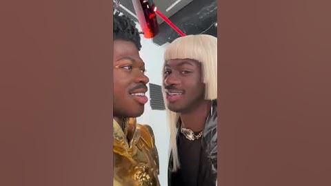 Lil Nas X kissing his statue 🙃