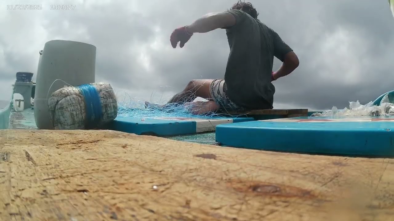 Tuna fishing in the Papuan sea during extreme weather.”