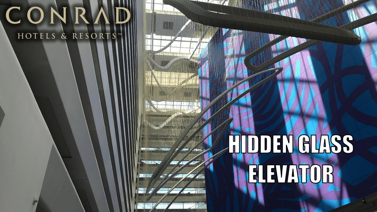 Beautiful Schindler Traction Glass Elevators - Conrad Hotel Downtown in NYC