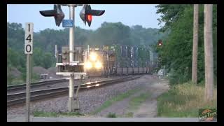 Surprise crossover train with a UP stack on a calm Montour, Ia. evening.
