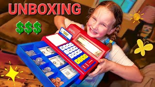 Unboxing toy cash register from Learning Resources