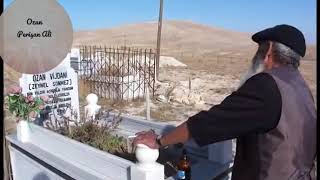 Ozan perişan Ali-Ozan vijdani'nin mezarında