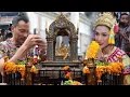 Two Hong Kong superstars pray at the Erawan Shrine on Tuesday