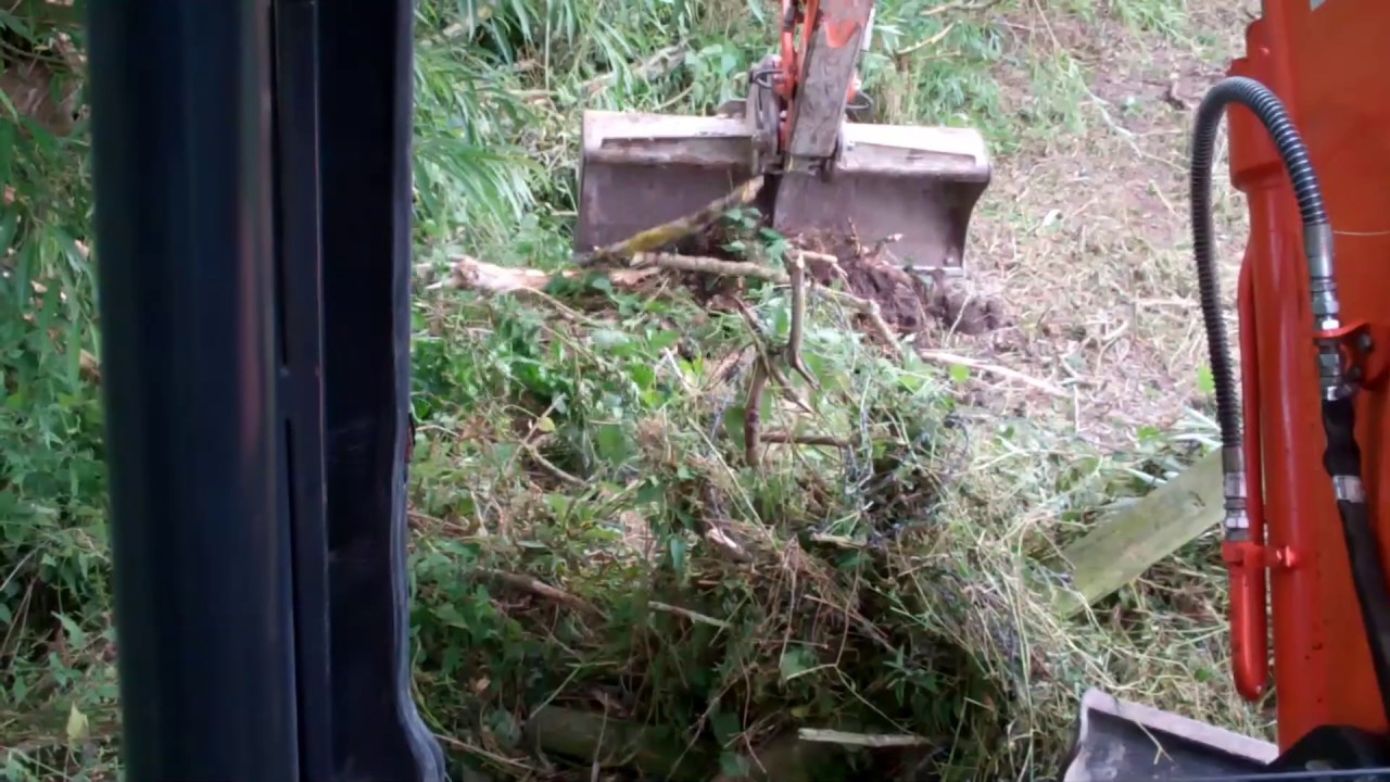 Doosan DX80r Excavator Clearing Old Fence Line - YouTube