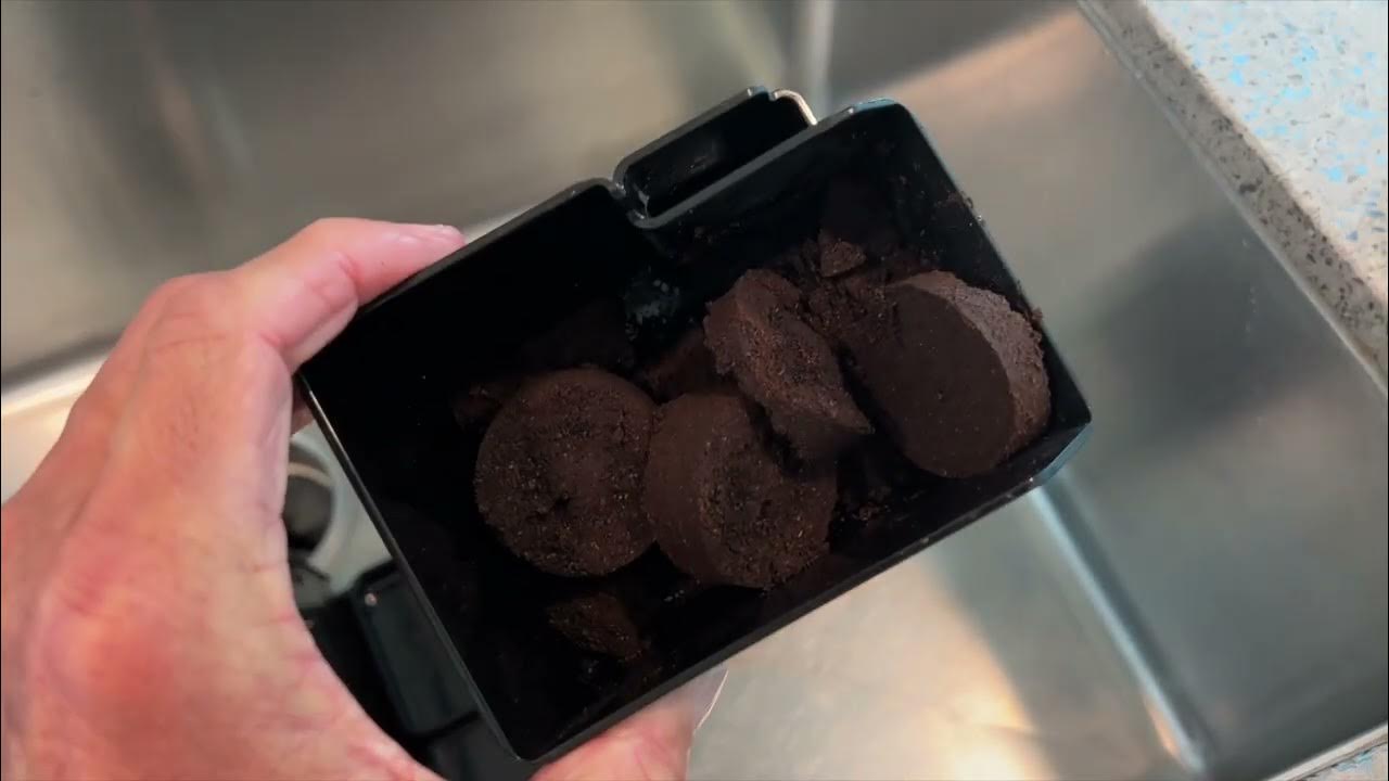 When should you clean drip tray and coffee grounds on jura ena 4