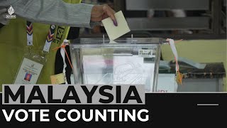 Malaysians vote for ‘hope, stability’ in hotly contested election