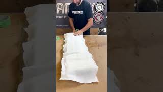 Fibreglassing a Foam Mold // #Shorts