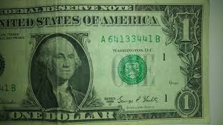 A 1969D series dollar bill