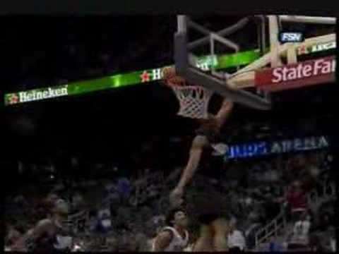 Andre Igoudala Smacks Josh Childress Shot against ...