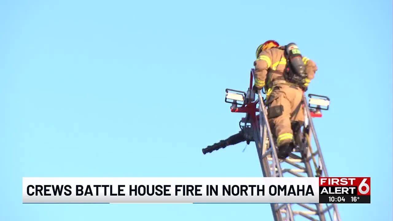 Crews battle North Omaha house fire - YouTube