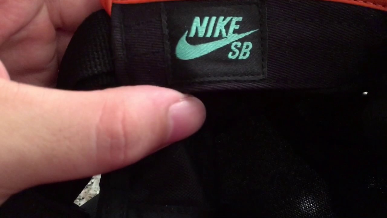 Как определить оригинал найк. Паленый найк значок. Fake Nike кепка.