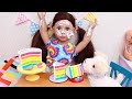 Doll makes rainbow cake! Play Dolls cooking and colors story