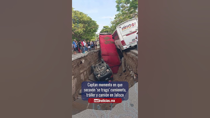 Captured moment sinkhole swallows pickup truck, trailer, and truck in Jalisco