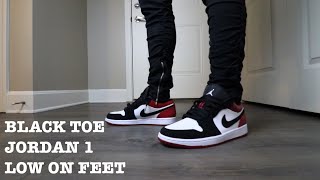 air jordan 1 low black toe on feet