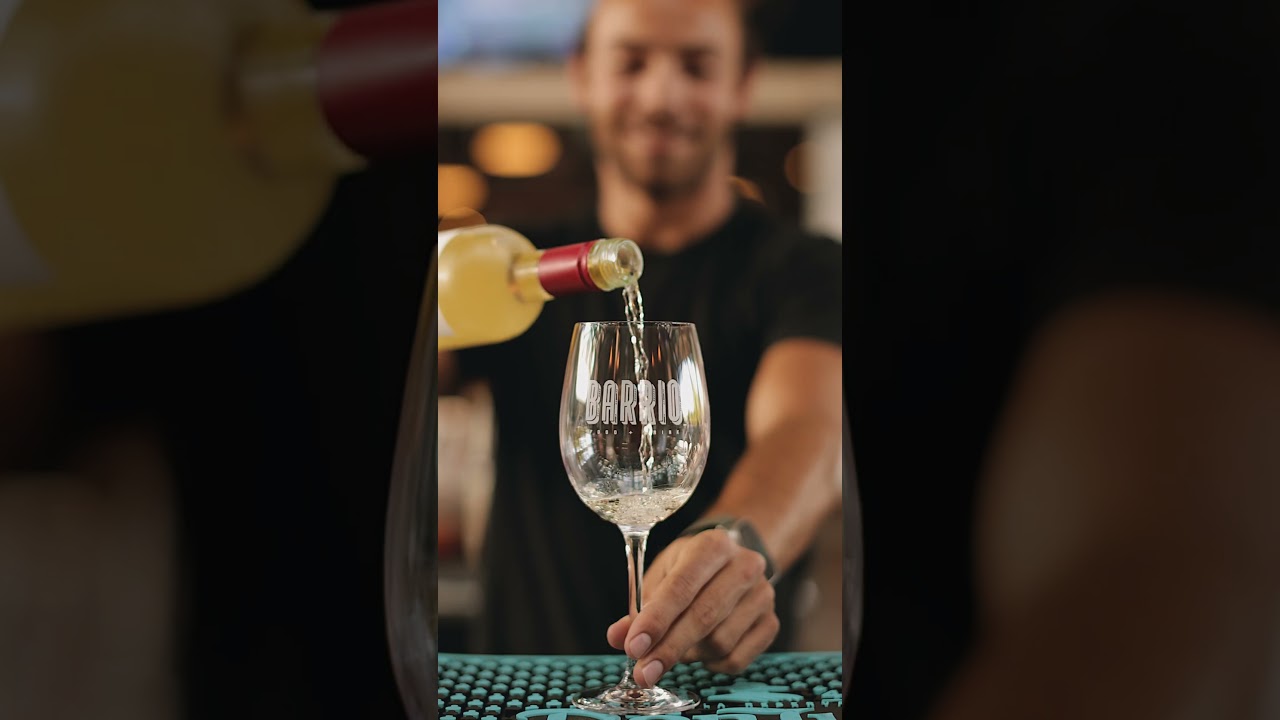 Refreshing Chill: Savoring Crisp White Wine on a Warm Summer Afternoon 🍷☀️