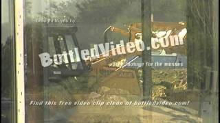 Free Stock Footage - Bulldozer Dumping Dirt at Construction Site by BottledVideo.com
