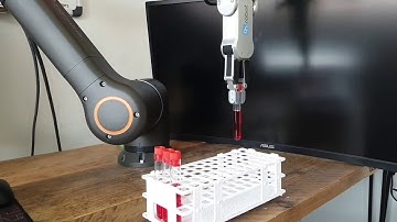 Loading & Unloading with Hanwha Robotics HCR-5 Collaborative Robot & OnRobot RG2 Gripper.