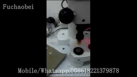 Three heads electromagnetic snap attaching machine