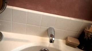 Bathtub with restricted flow at the hot water position..AVI