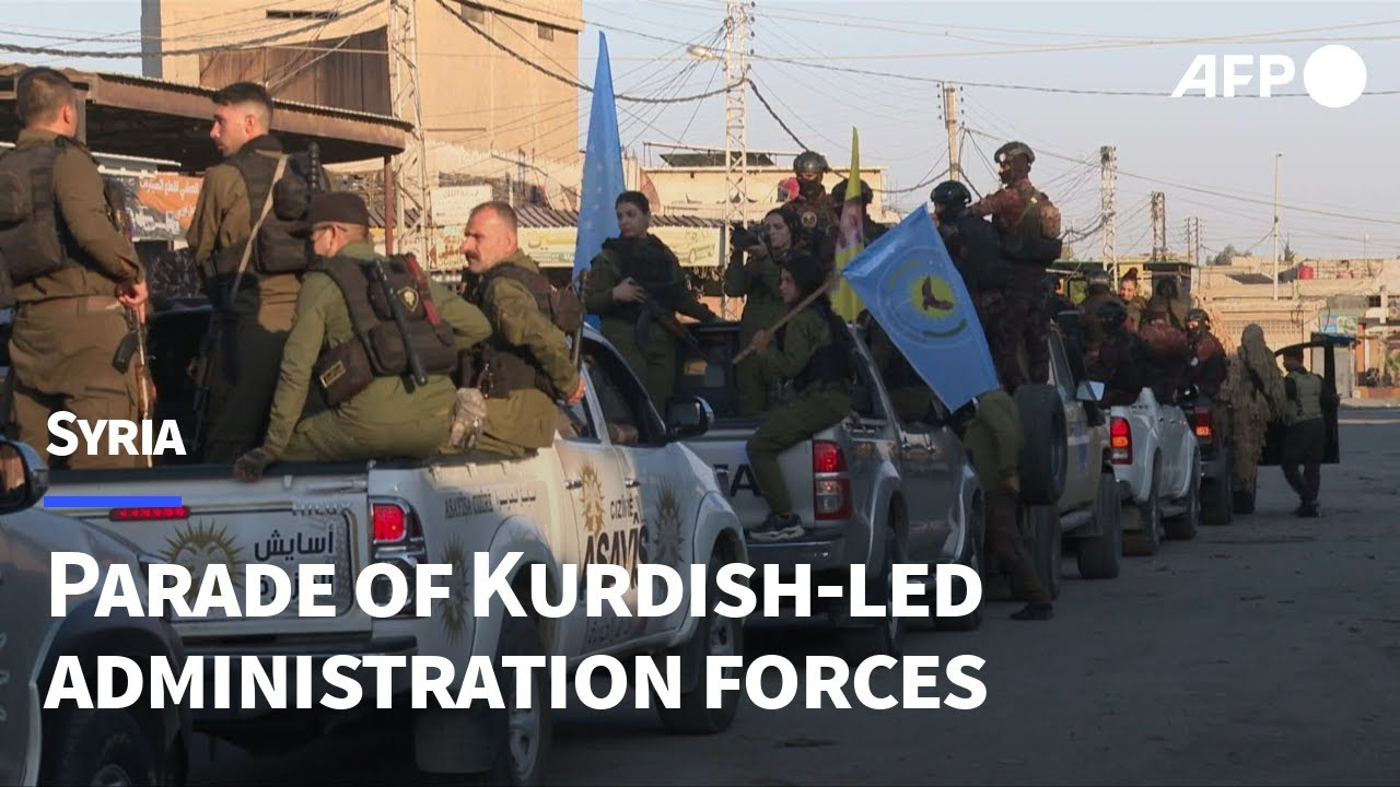Forces of Kurdish-led administration in northeast Syria hold parade | AFP