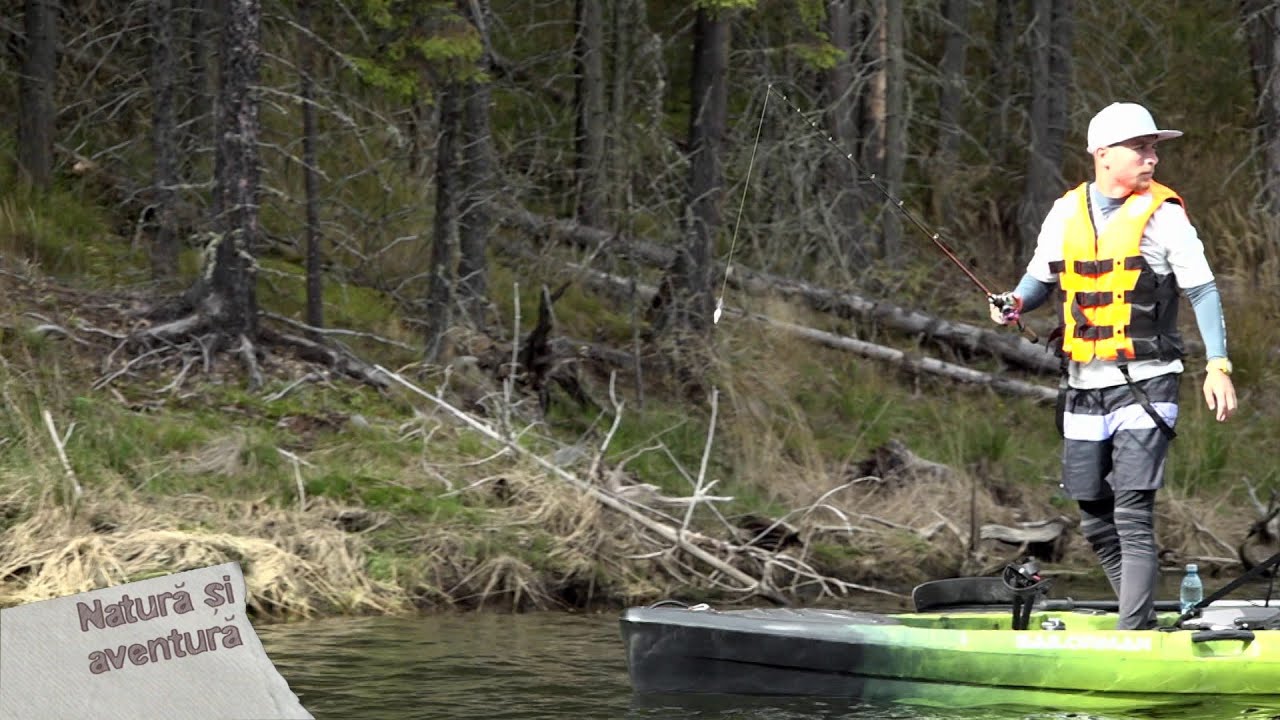 Natura si aventura: la pescuit din caiac pe lac de munte