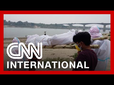 Makeshift crematoriums are built as India's crisis worsens