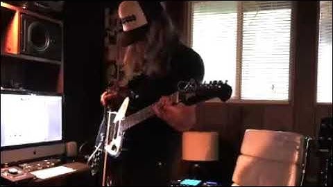 Cello bow and Gibson Firebird non-reverse guitar