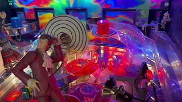 2001 Stern Austin Powers Pinball Machine in attract mode with color changing LED