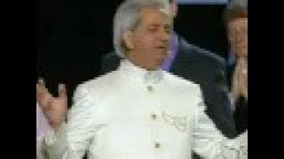 Benny Hinn sings 'I STAND IN AWE OF YOU'