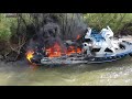 8-30-2021 New Orleans, La- Looting after Hurricane Ida- Loose boat on fire on Ms River- Drone