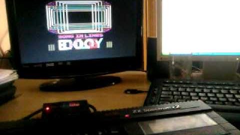 Watching various demos in my Spectrum +2 with divIDE plus